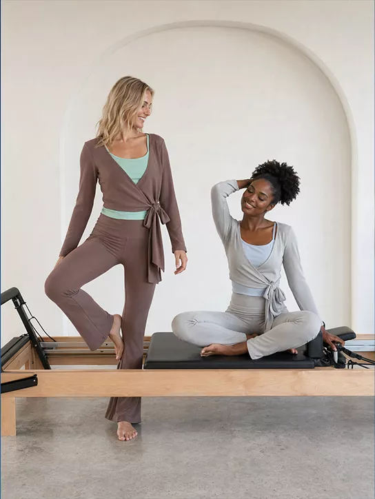 Models demonstrating fitness products in a lifestyle shoot.