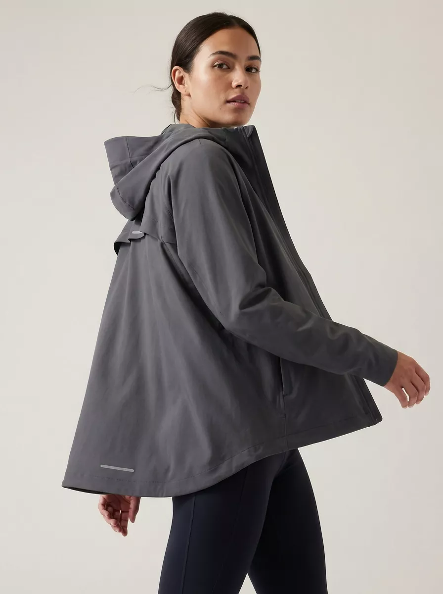 A model wearing a jacket in a fashion shoot.