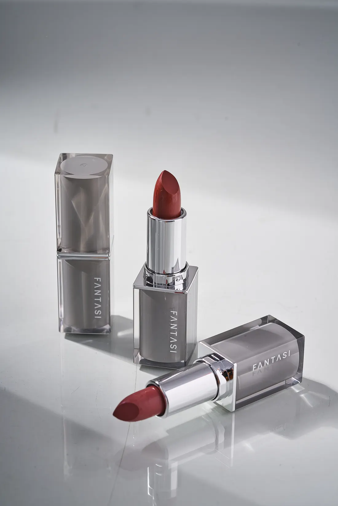 Lipstick reflective still life, photographed by Southlake Vision in China.