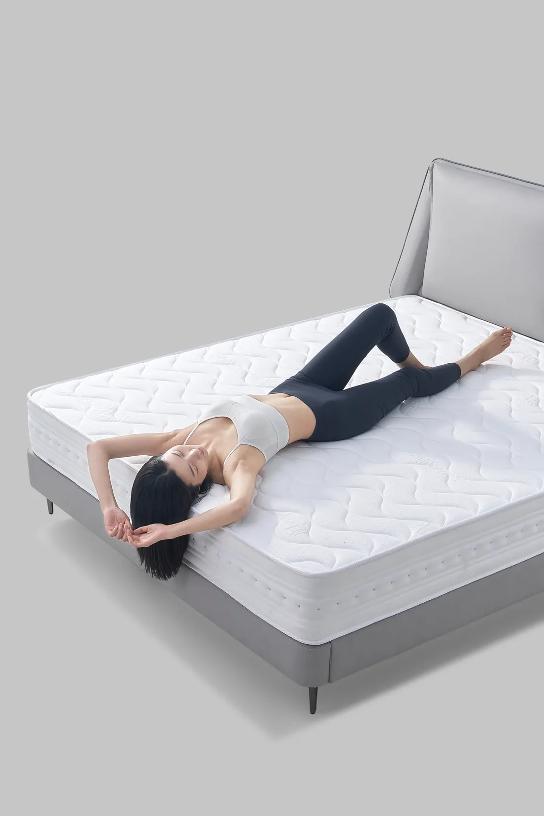 Mattress comfort with model, photographed by Southlake Vision in China.