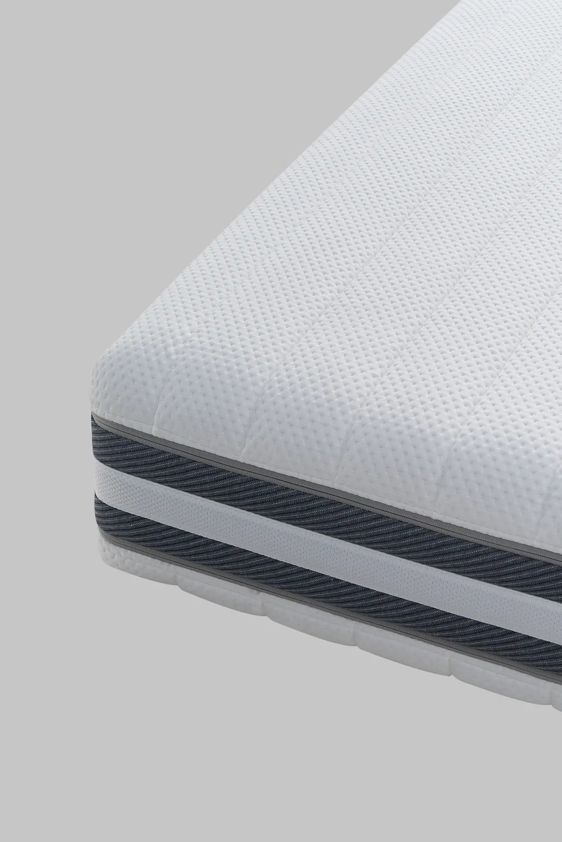 Mattress edge and fabric detail, photographed by Southlake Vision in China.
