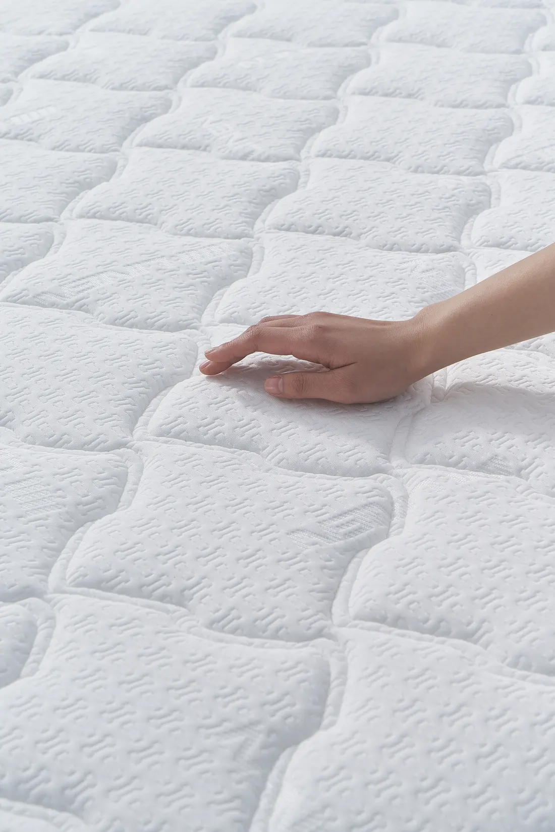 Quilted mattress surface detail, photographed by Southlake Vision in China.