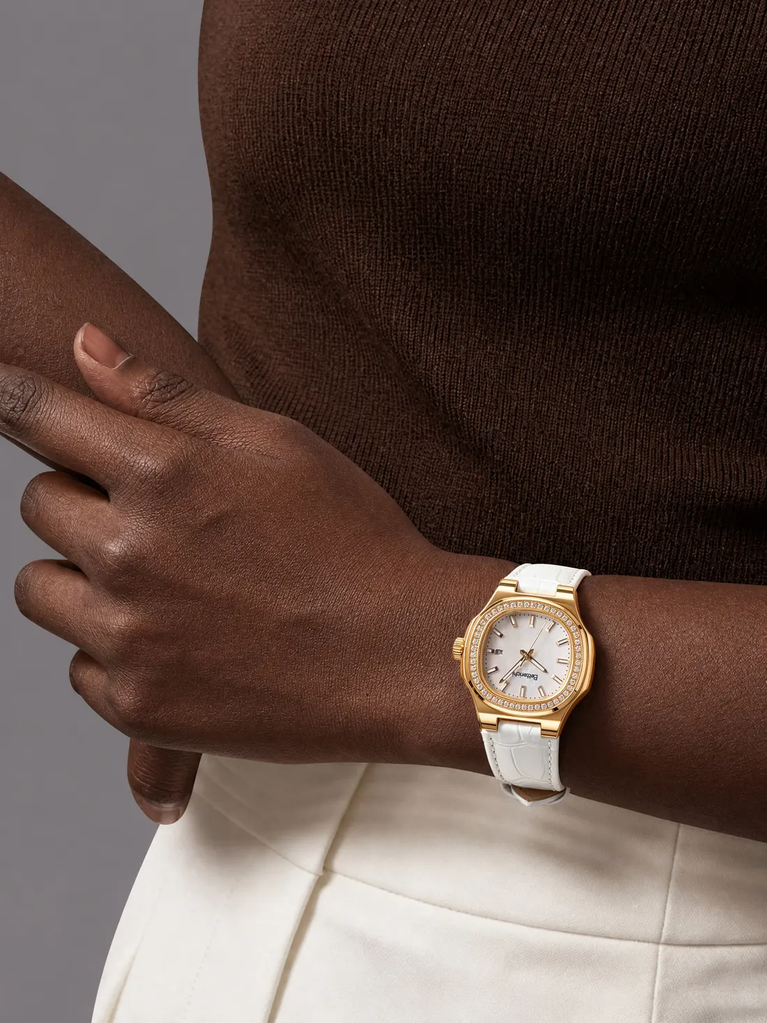 Gold watch on model, photographed by Southlake Vision in China.