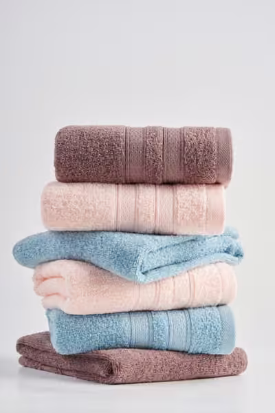 Layered pastel bath towel collection, home textile product photography by Southlake Vision in China.