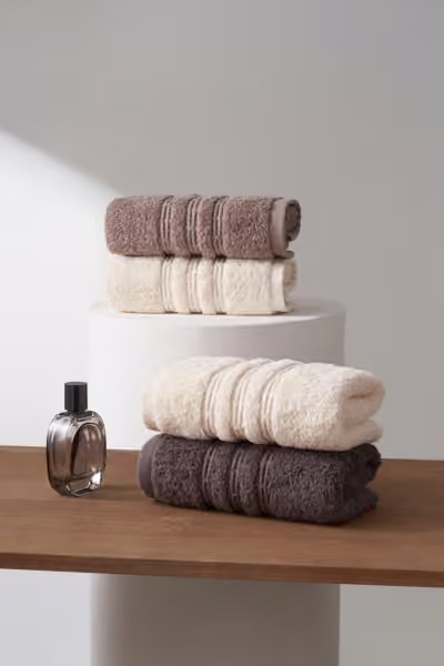 Bathroom towel collection with floating display, home textile product photography by Southlake Vision in China.
