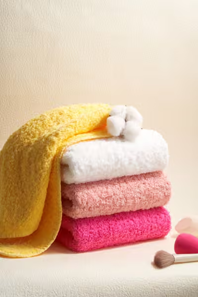Colourful towels with cotton flowers, home textile product photography by Southlake Vision in China.