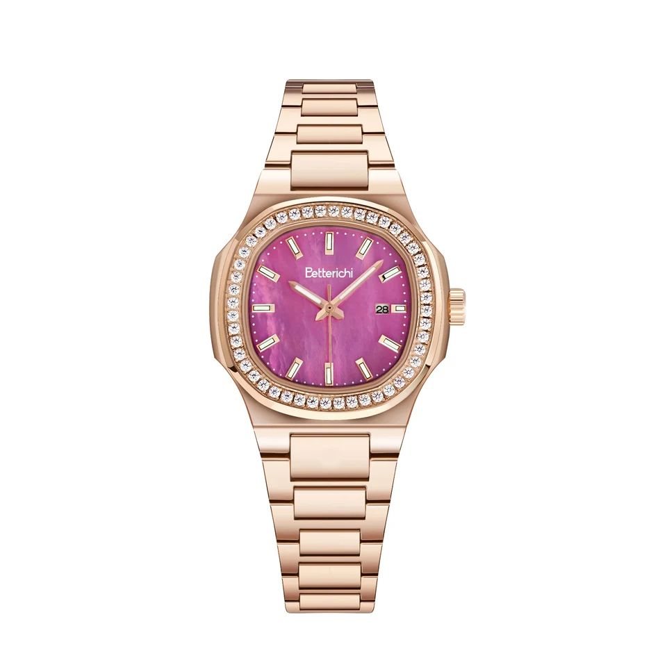 Rose gold watch with a pink dial photographed on a white background.